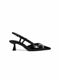 Black high-heeled sandal with a decorative strap on a white background