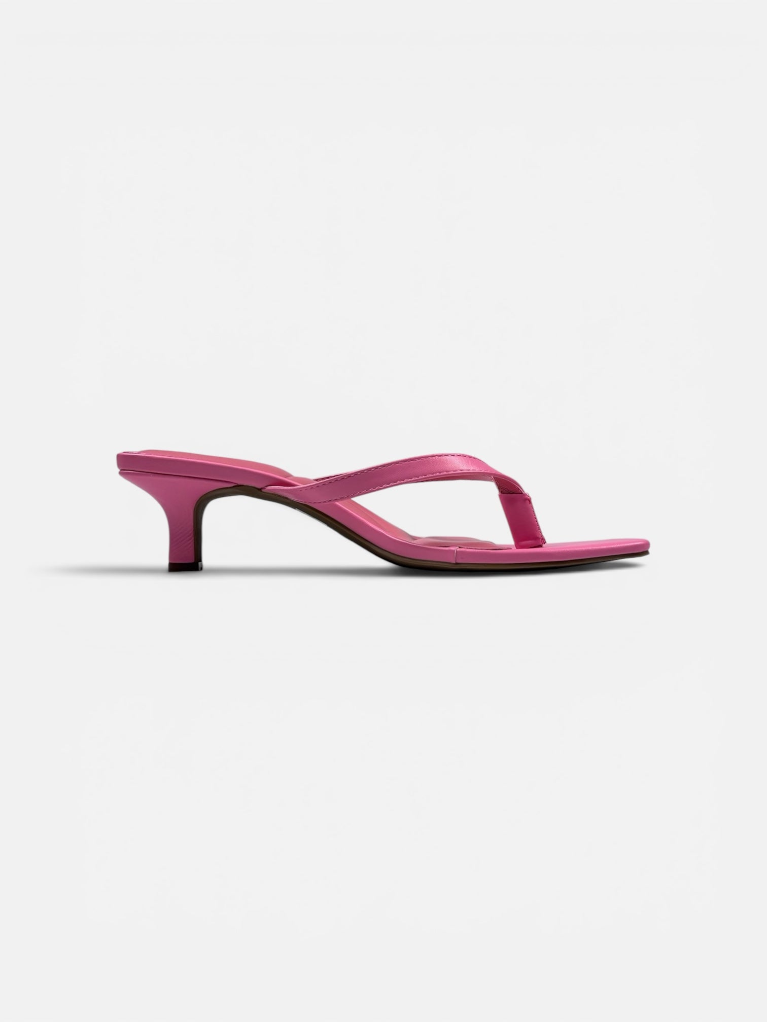 Pink sandal on a white background