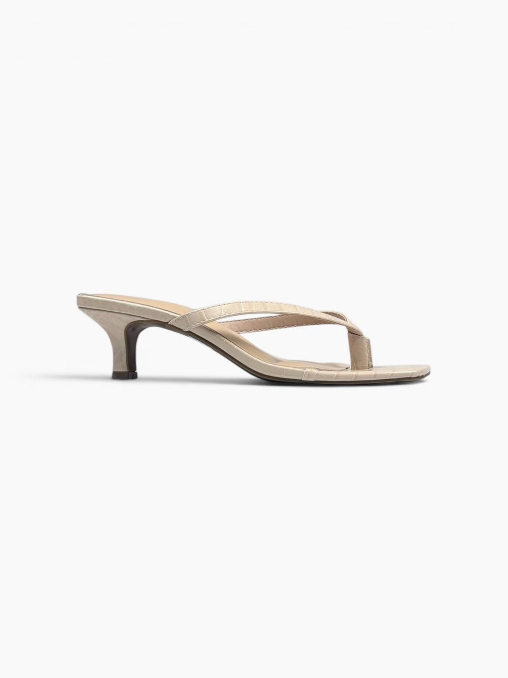 Beige sandal on a white background